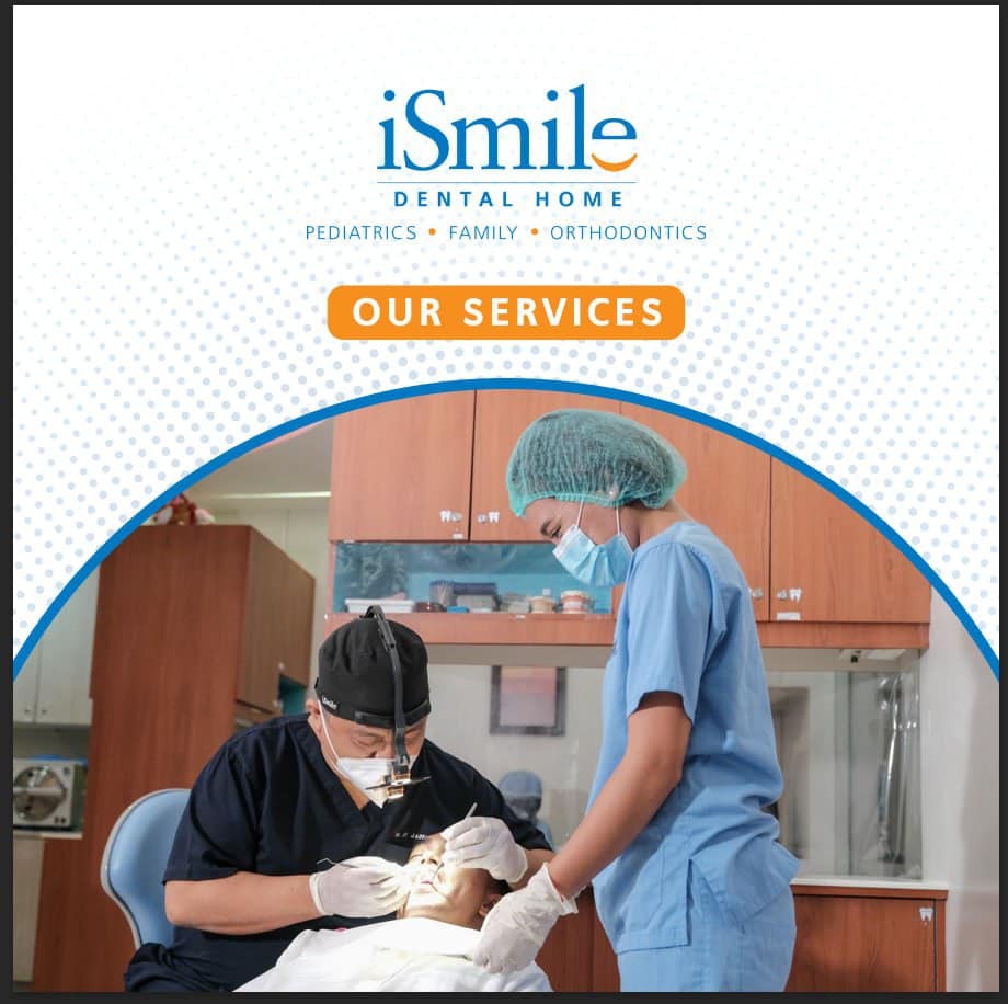 Dentist consulting with a patient at iSmile Dental Home